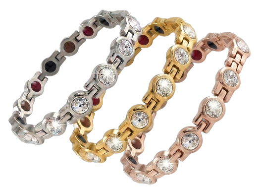 Collection of premium magnetic bio-health bracelets shown together in silver, gold, and rose gold finishes with crystal accents.
