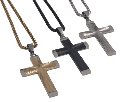Gold black and silver-tone stainless steel cross pendant necklace featuring a radiant sunburst radial texture in the center, framed by smooth polished borders, hanging on a gold box chain against a black background.