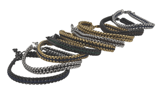 Assorted stainless steel IP-plated link bracelets featuring colorful woven threads.